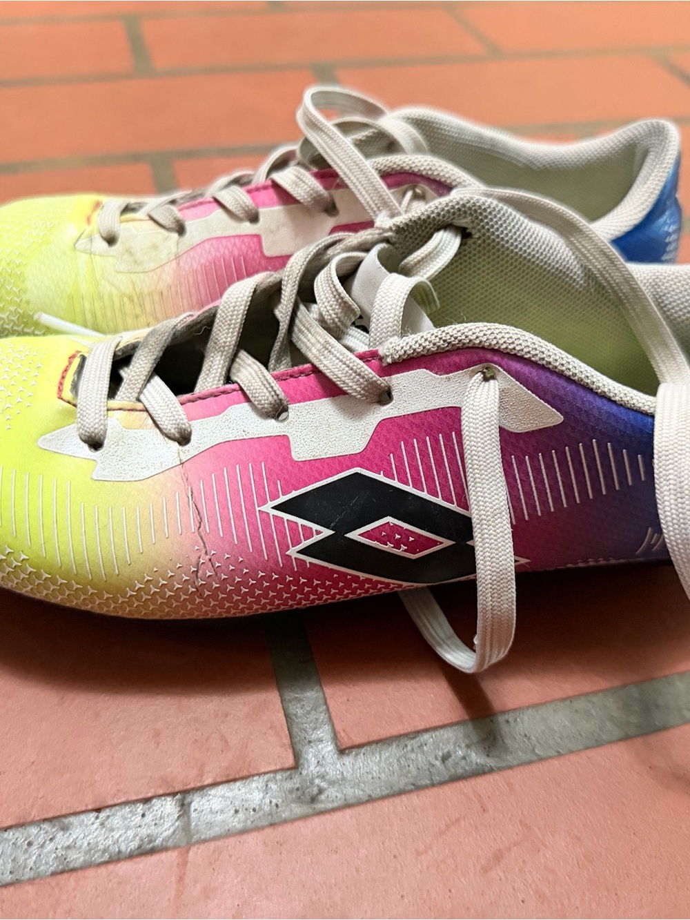 OTTO Kids Gradient cleats in Yellow, Pink, Purple and Blue